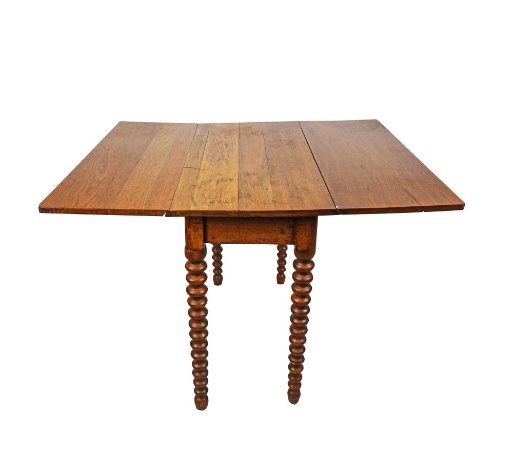 Appraisal: AMERICAN DROP LEAF TABLEwith turned legs inches wide inches deep