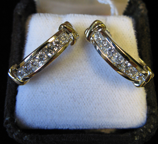 Appraisal: PAIR OF DIAMOND AND FOURTEEN KARAT WHITE AND YELLOW GOLD