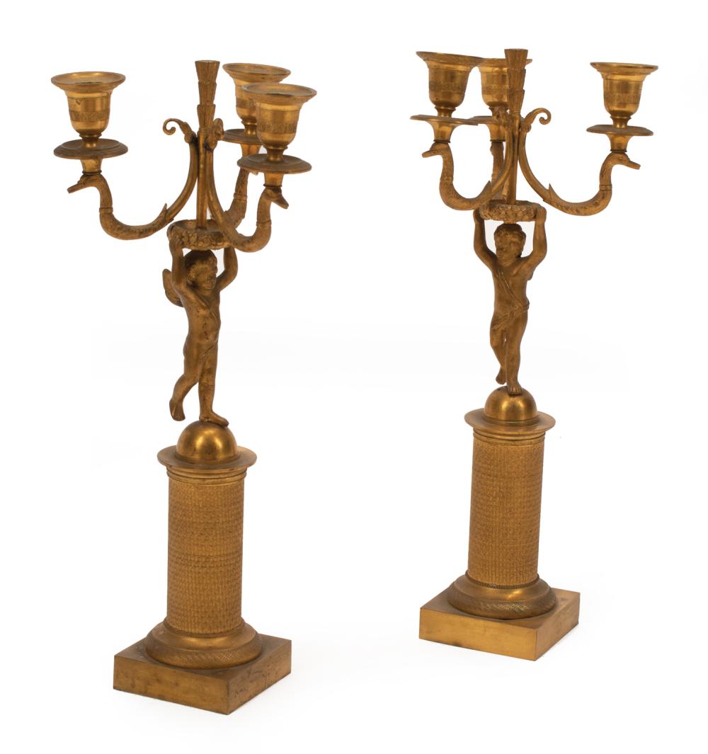 Appraisal: Pair of Empire-Style Gilt Bronze Three-Light Figural Candelabra th c