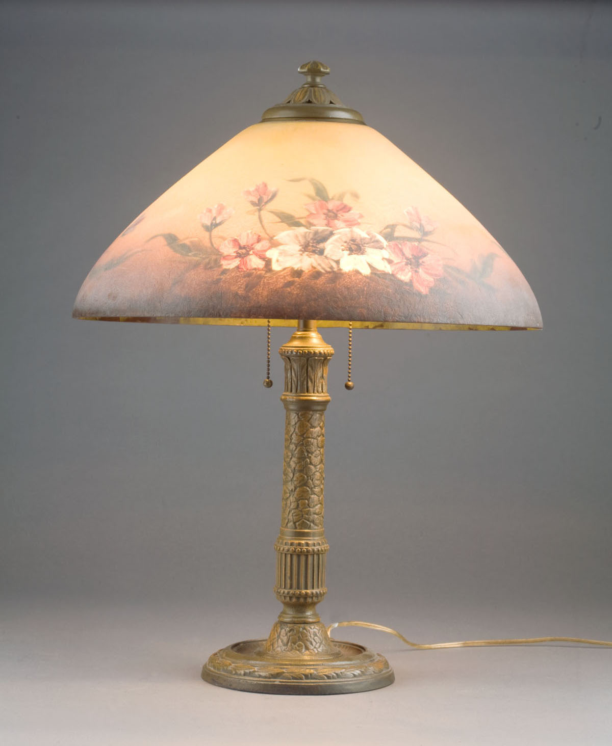 Appraisal: ARTS CRAFTS REVERSE PAINTED GLASS BOUDOIR LAMP E M COMPANY