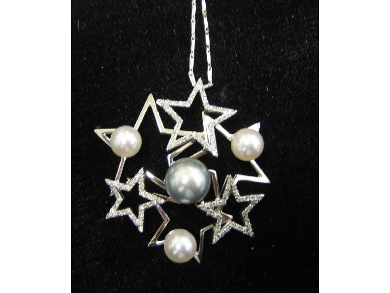 Appraisal: PEARL AND DIAMOND PENDANT k white gold with open star