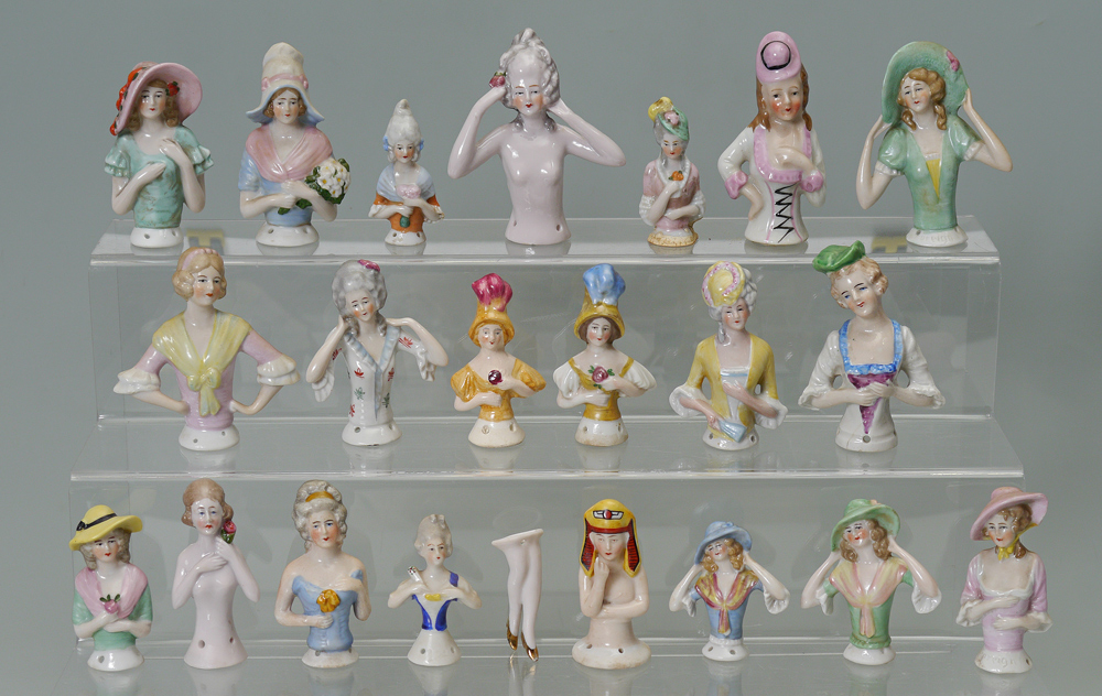 Appraisal: PORCELAIN HALF DOLLS Part of an estate collection of porcelain