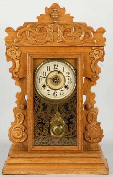 Appraisal: Oak Gingerbread Shelf Clock Description Working Time and strike Reverse