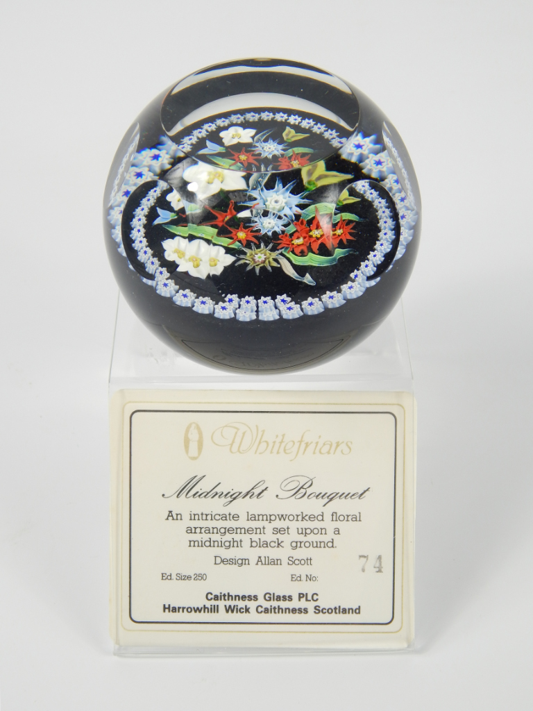 Appraisal: A Whitefriars cut glass paperweight Midnight Bouquet designed by Allan