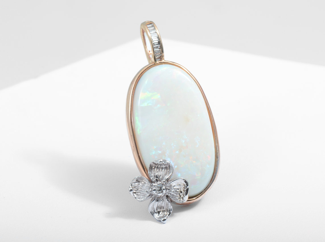 Appraisal: CUSTOM CT OPAL AND DIAMOND PENDANT K yellow gold pendant