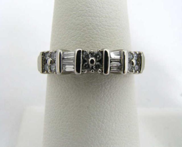 Appraisal: k white gold ctw baguette and round diamond anniversary band