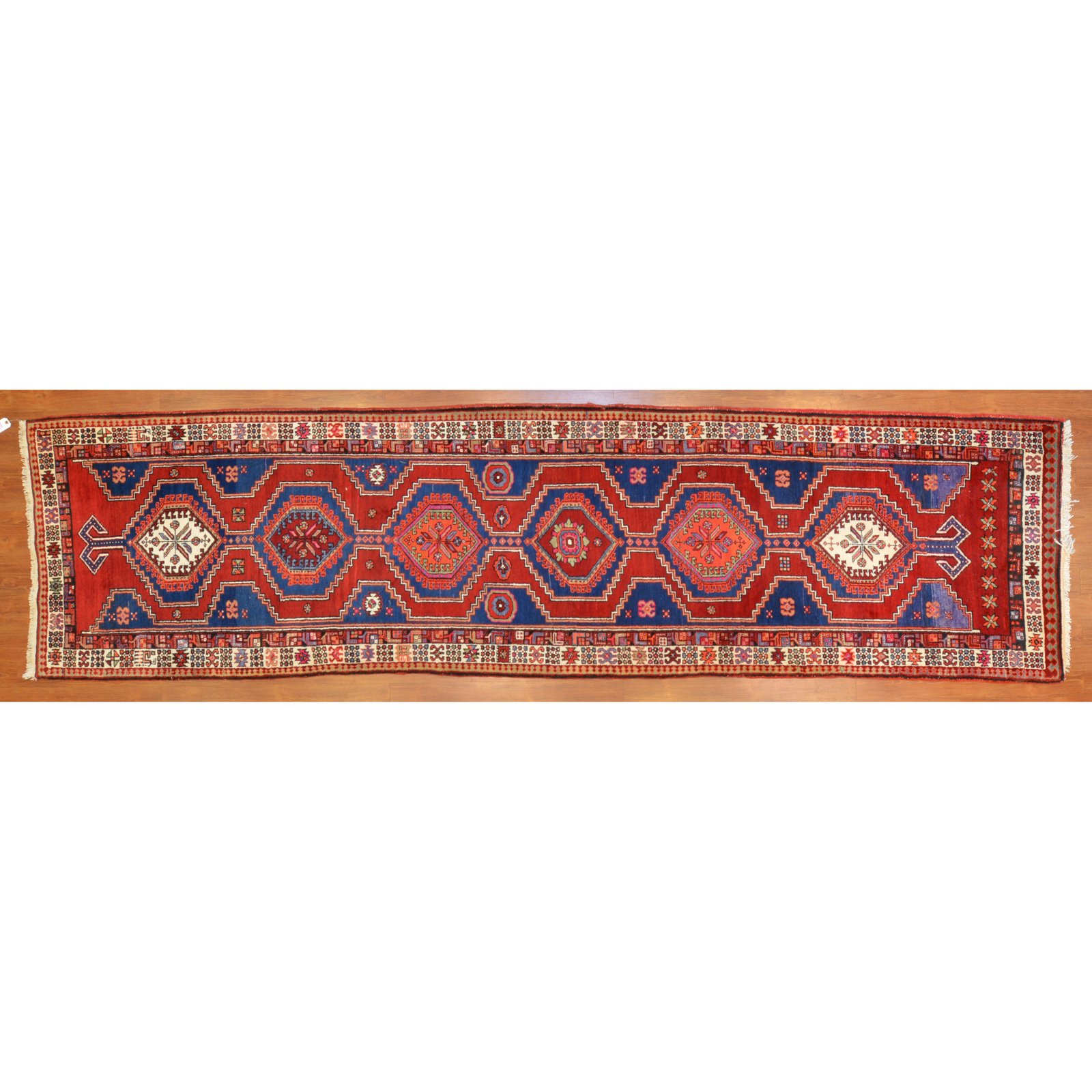 Appraisal: NORTHWEST RUNNER PERSIA X Fourth quarter- th century hand-knotted wool