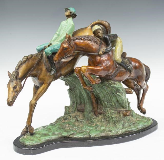 Appraisal: Bronze sculpture depicting two steeplechase horses with jockeys rising on