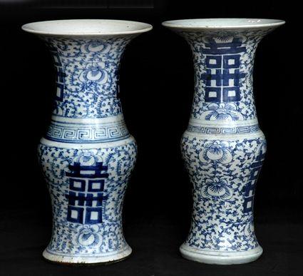 Appraisal: ASSEMBLED PAIR OF CHINESE BLUE AND WHITE PORCELAIN BALUSTER-FORM VASES