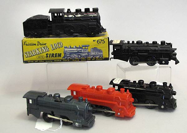 Appraisal: Plastic grouping Lot includes boxed British Swansea Sparkling friction Loco