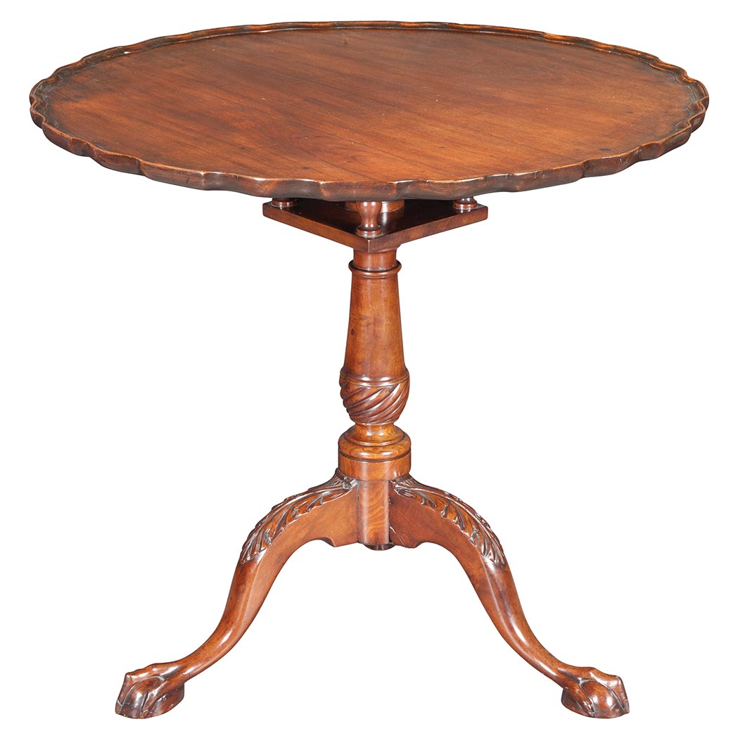 Appraisal: Chippendale Mahogany Tilt-Top Tea Table The piecrust top above a