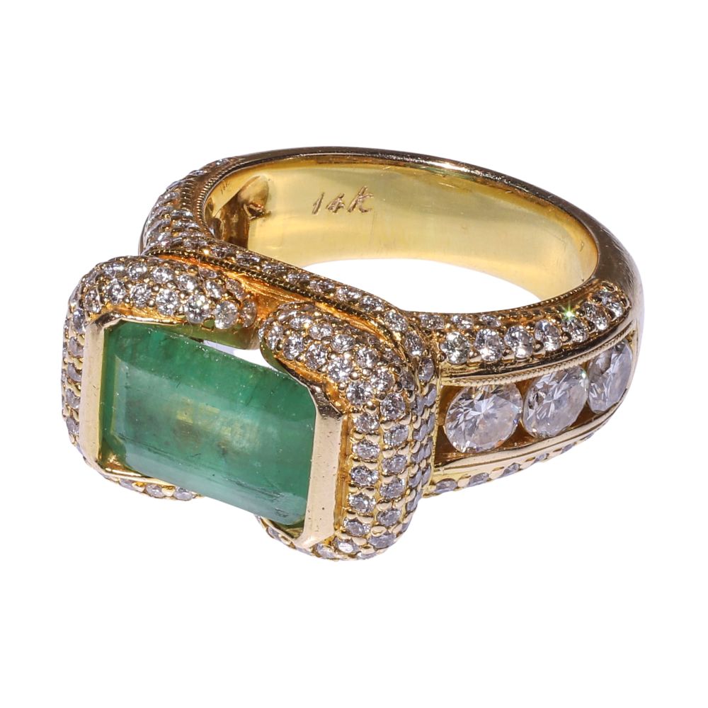 Appraisal: K YELLOW GOLD EMERALD AND DIAMOND RINGHaving an mm by