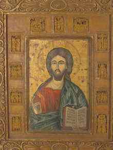 Appraisal: An Icon of Chris Pantocrator surrounded by carved festival scenes