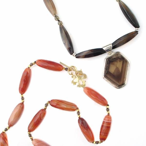 Appraisal: Two Banded Agate Necklaces The first consisting of elongated oval