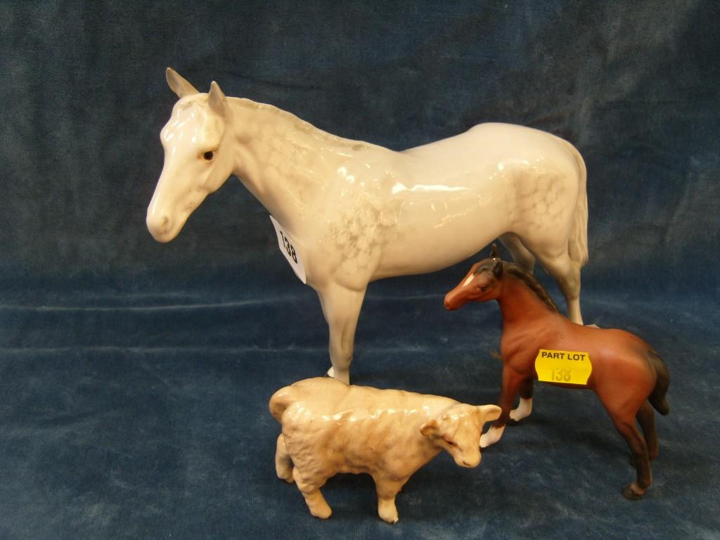 Appraisal: A Beswick model of a white horse with dappled grey