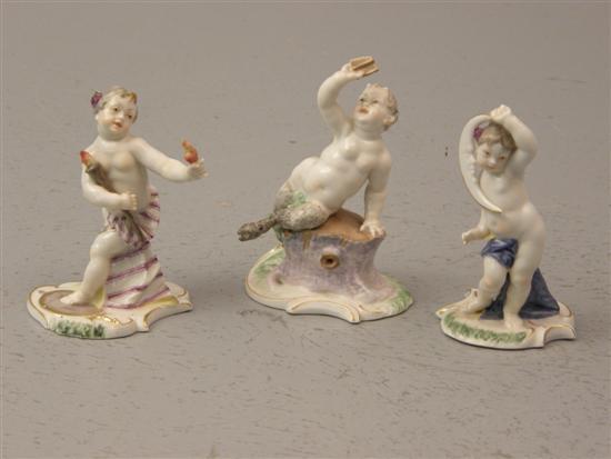 Appraisal: Set of three Dresden figures Putti holding the crescent moon