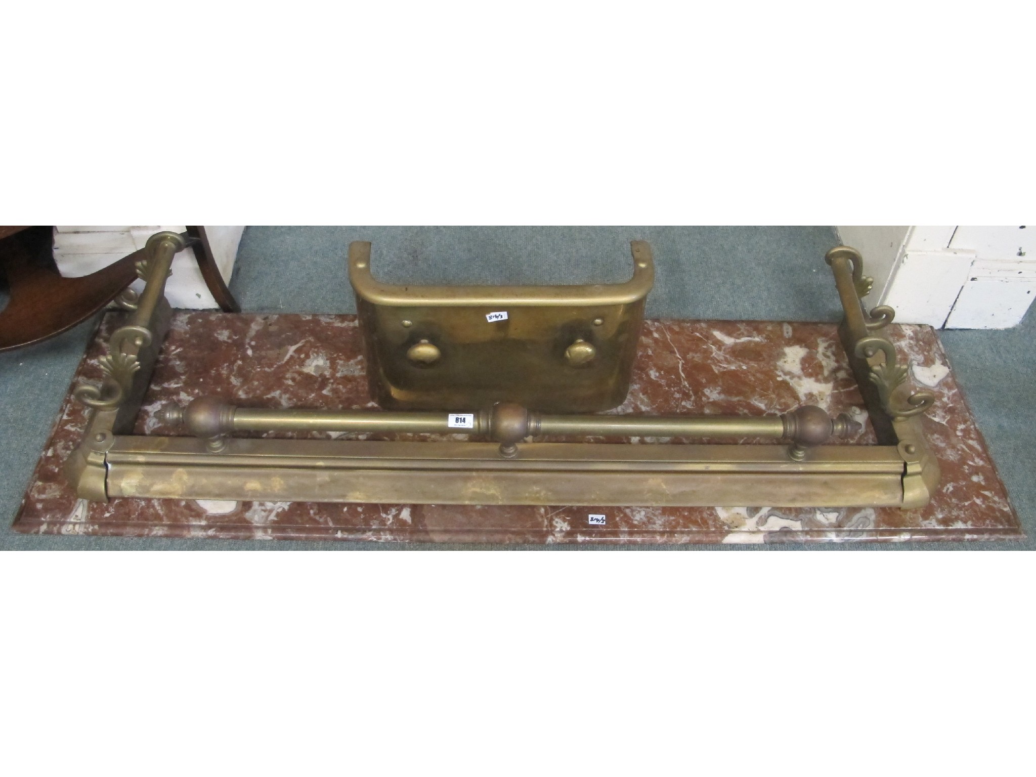 Appraisal: A brass fender a brass fret and a marble top