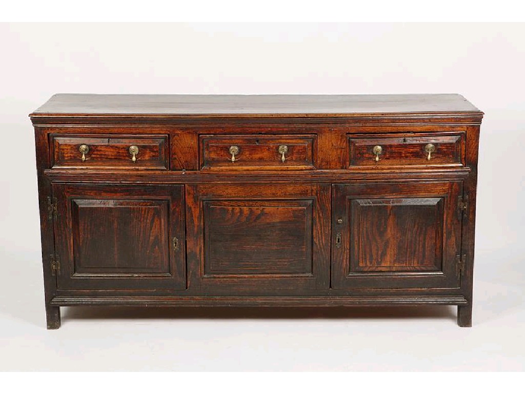 Appraisal: A GEORGE II OAK DRESSER BASE the rectangular top with