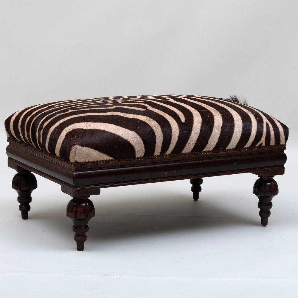 Appraisal: Zebra Upholstered and Mahogany Ottoman x x in Condition Minor