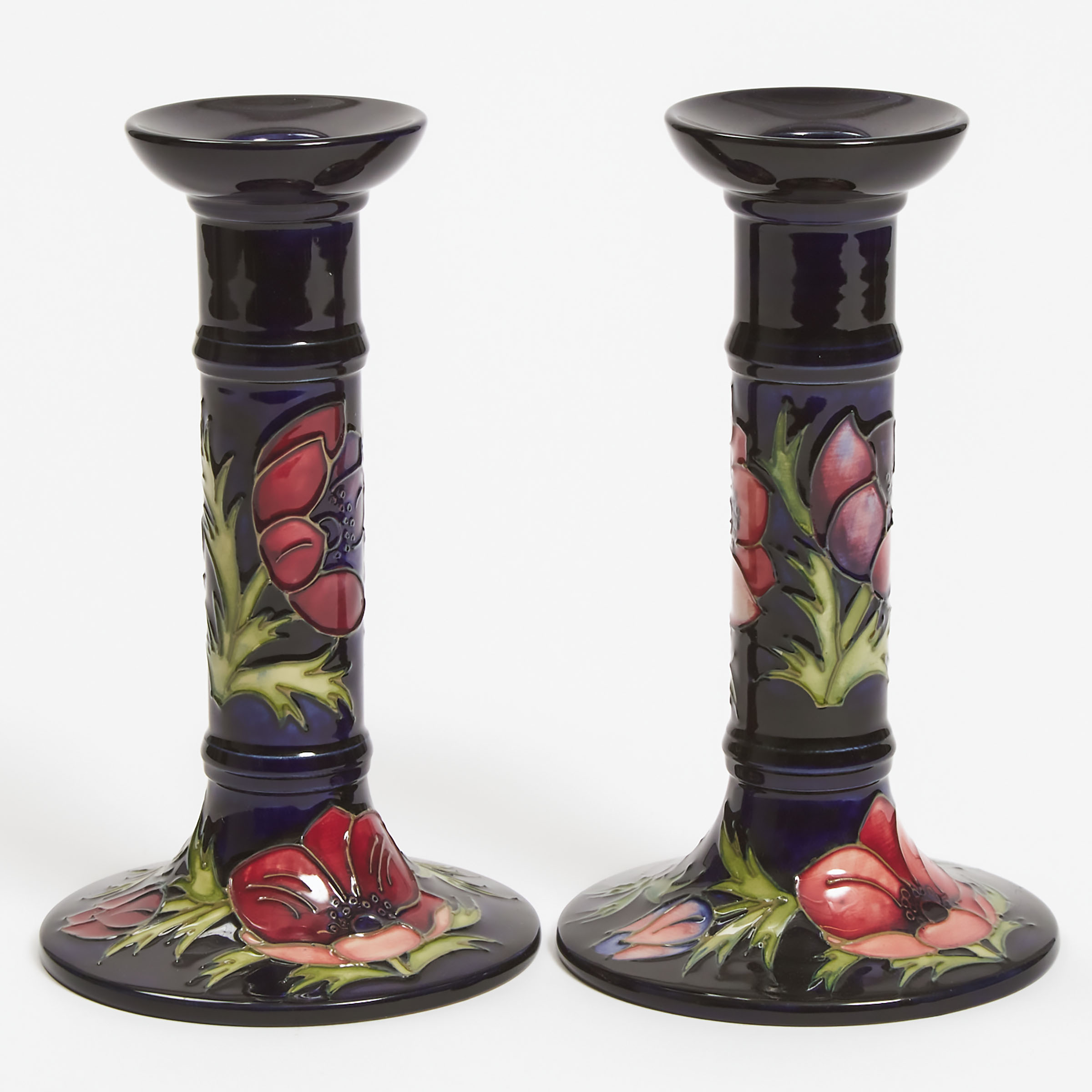 Appraisal: Pair of Moorcroft Anemone Candlesticks height in cm