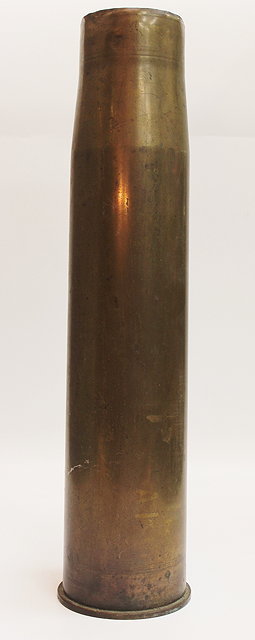 Appraisal: A LARGE BRASS SHELL CASE marked to the underside MMPKRW