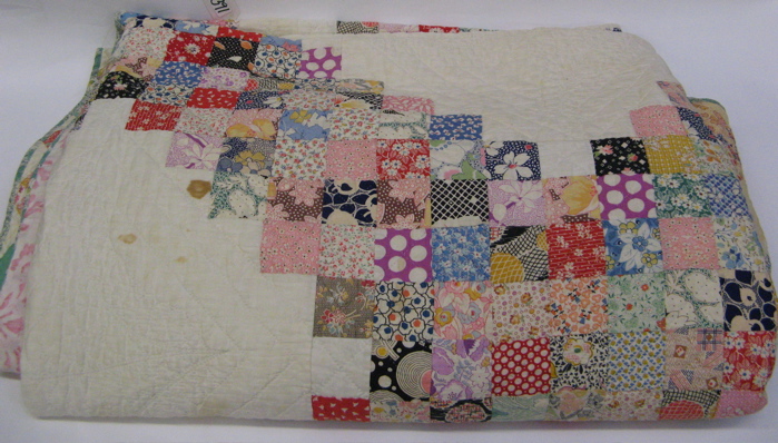 Appraisal: AMERICAN HANDMADE AND QUILTED PATCHWORK QUILT multi-color pattern fabric on