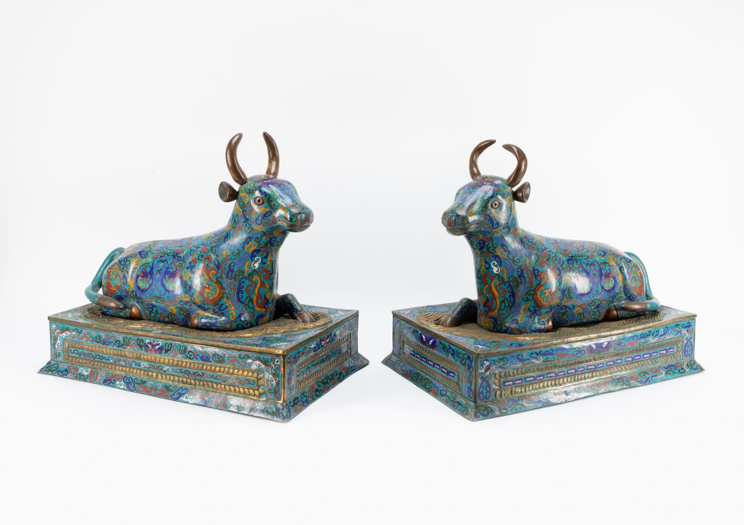 Appraisal: PAIR CHINESE BLUE CLOISONNE BULLS ON STANDS Pair of large