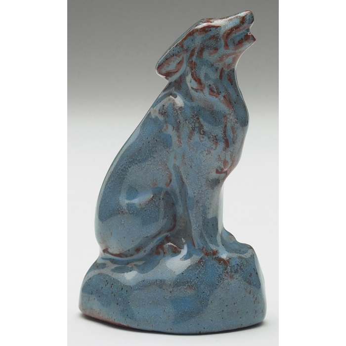 Appraisal: North Dakota School of Mines figural howling wolf covered in