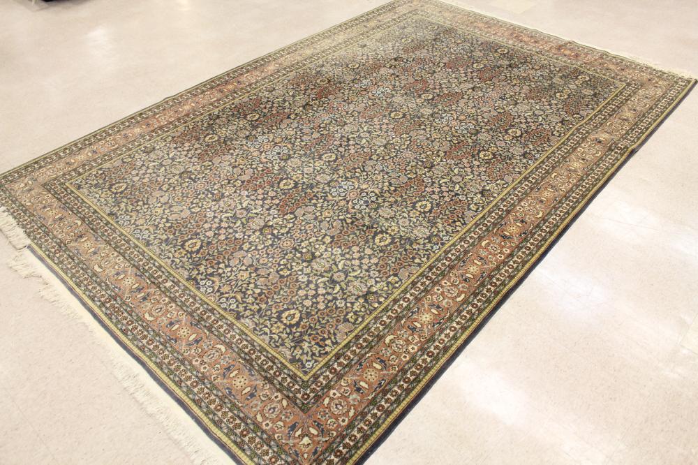 Appraisal: HAND KNOTTED ORIENTAL CARPET Pakistani Persian overall floral design on