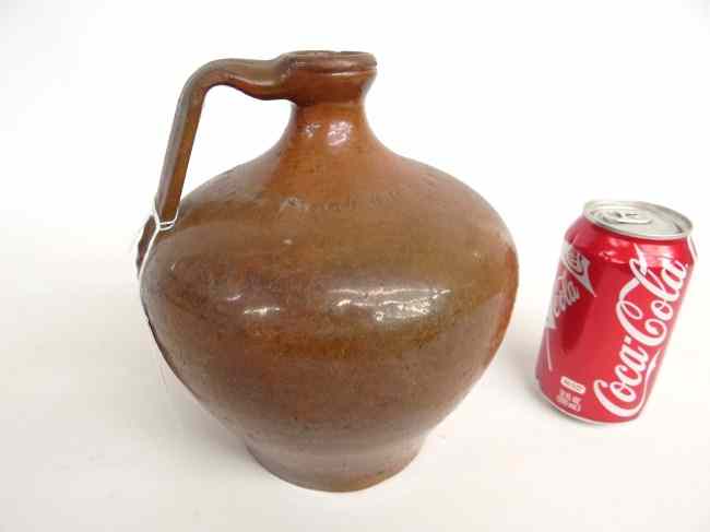 Appraisal: th c Spanish redware jug with salt glaze '' Ht