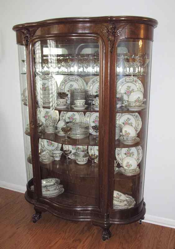 Appraisal: HORNER QUALITY TIGER OAK TRIPLE BOW FRONT CHINA CABINET Serpentine