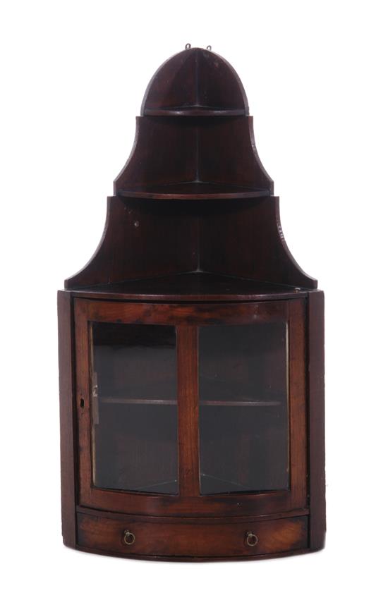 Appraisal: English mahogany hanging corner cabinet late th century tiered top