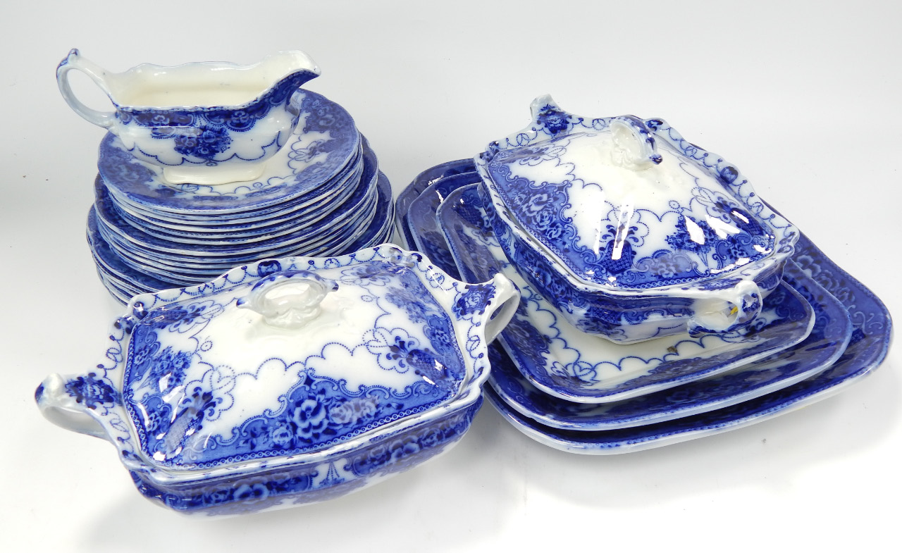 Appraisal: A Lonsdale pattern flow blue dinner service including three rectangular