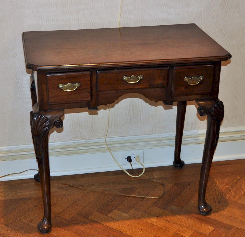 Appraisal: English Queen Anne Carved Mahogany Dressing Table on refined shell