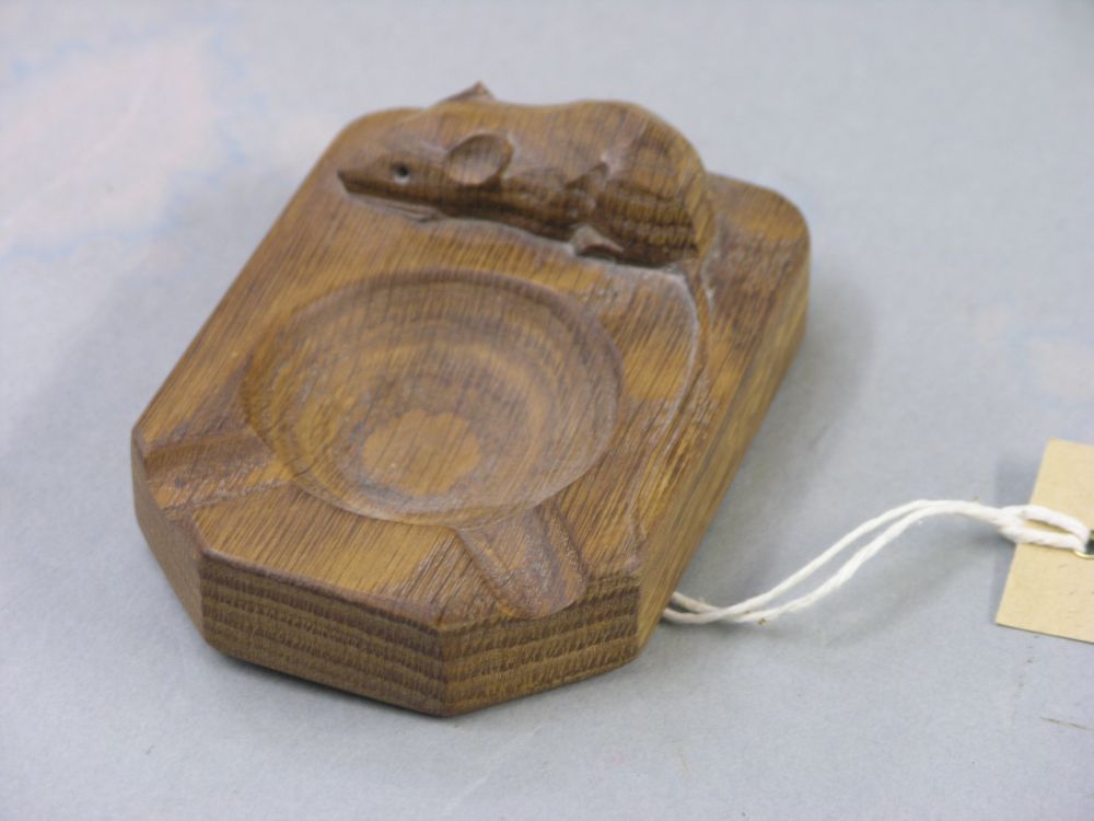 Appraisal: A carved oak ash-tray by Robert 'Mouseman' Thompson mouse is