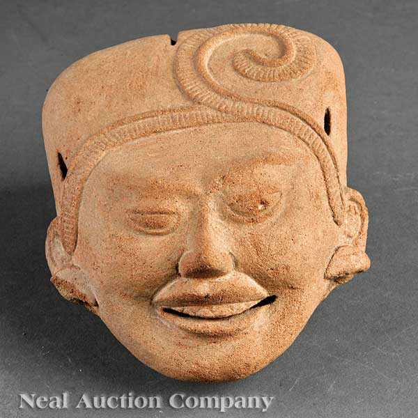 Appraisal: A Pre-Columbian Pottery Sonriente Head Veracruz realistically modeled smiling face