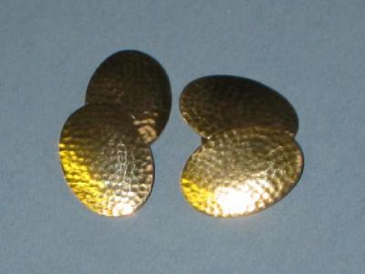 Appraisal: A PAIR OF CT GOLD CUFFLINKS comprising two oval spot