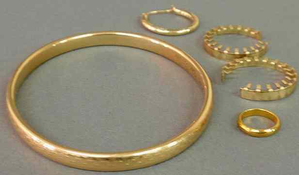 Appraisal: Gold bangle bracelet k engraved wavy decoration dwt and a