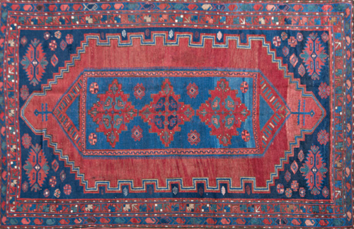 Appraisal: CAUCASIAN KAZAK Carpet with long geometric central medallion in blue