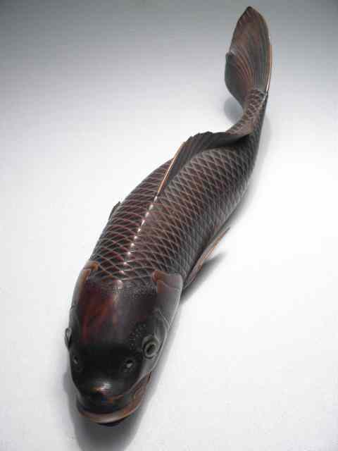 Appraisal: Japanese carved wood carp Intricately carved details signed on base