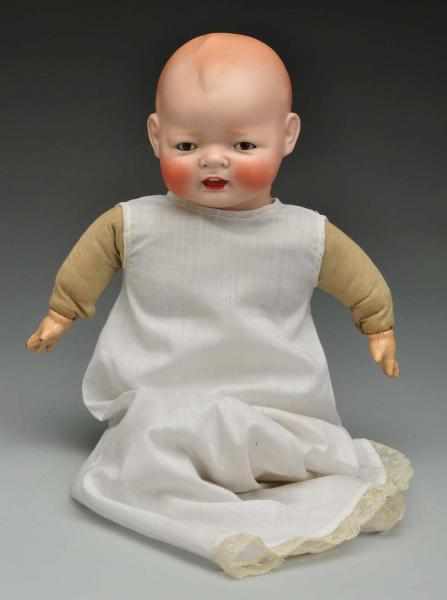 Appraisal: Smiling Century Baby Doll Description German bisque flange head incised