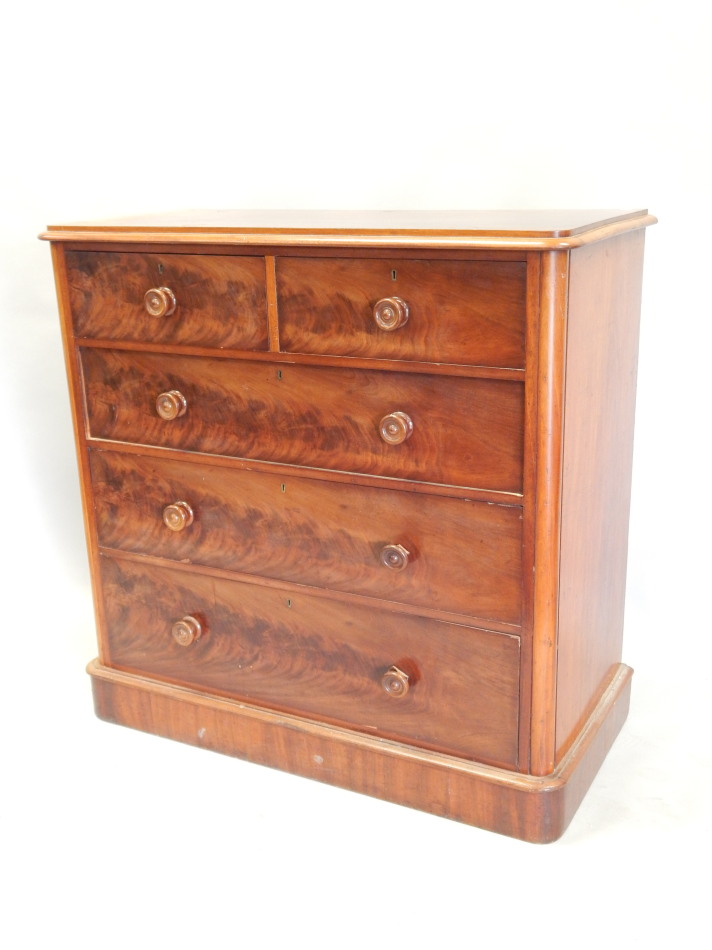 Appraisal: A Victorian mahogany chest of two short and three long