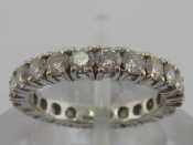 Appraisal: A white metal tests carat gold diamond eternity ring the