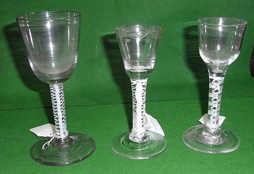 Appraisal: AN ANTIQUE DRINKING GLASS with opaque twist stem and round