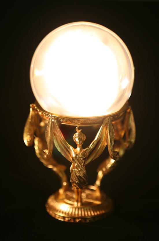 Appraisal: JEANE DIXON'S CRYSTAL BALL On separate gilt-metal stand cast as