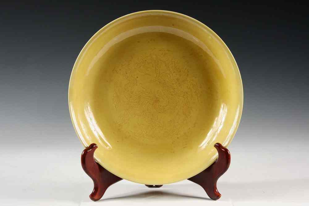 Appraisal: BOWL - Imperial yellow incised dragon low bowl signed on