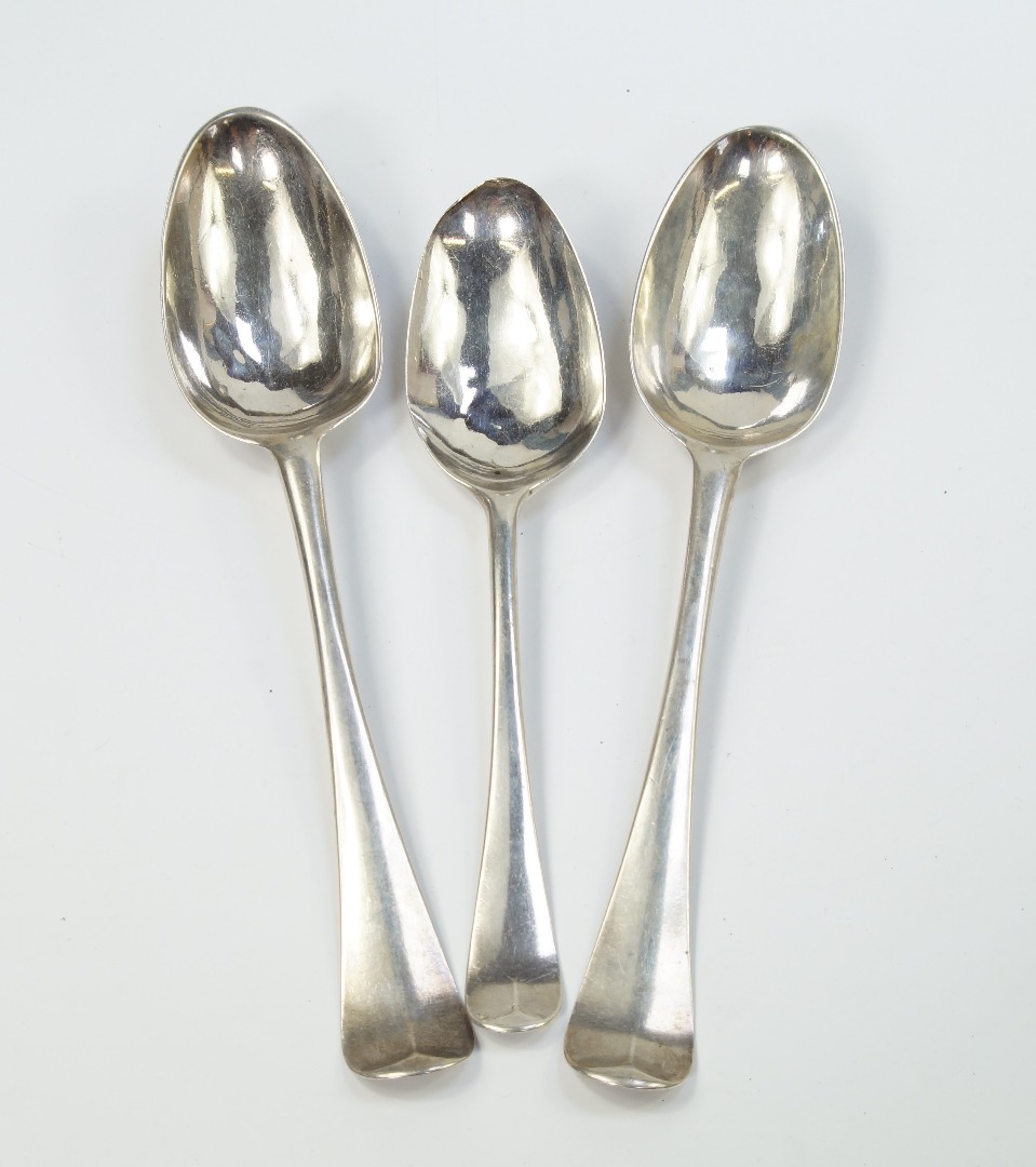 Appraisal: A pair of George III silver tablespoons decorated in the