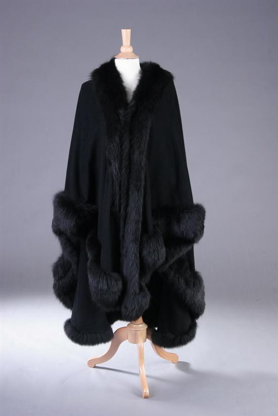 Appraisal: LADY'S LONG BLACK WOOL CAPE WITH FOX TRIM http www