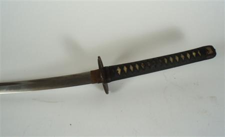 Appraisal: An early th century Japanese katana the grip of white