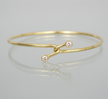 Appraisal: A Tiffany Co Diamond Bracelet k yellow gold tubular bangle